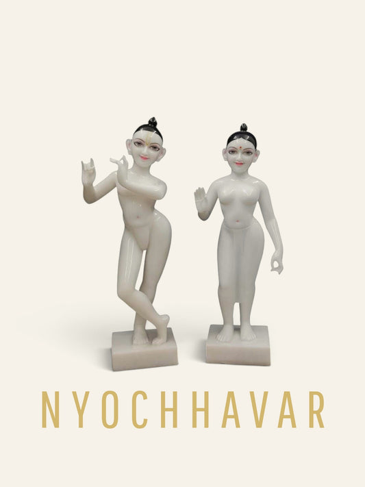 Pair of white marble Radha Krishna murtis in temple style, carved undraped for daily dressing and shringar